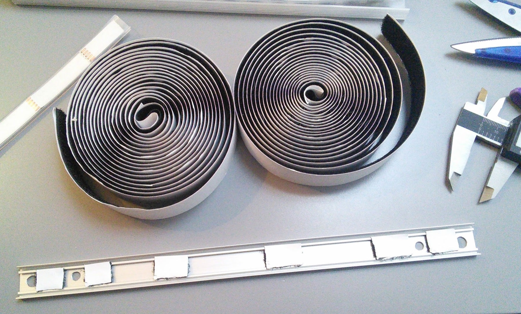 Rolls of velcro tape with a sticky side to attach the LED strips to the aluminum channel